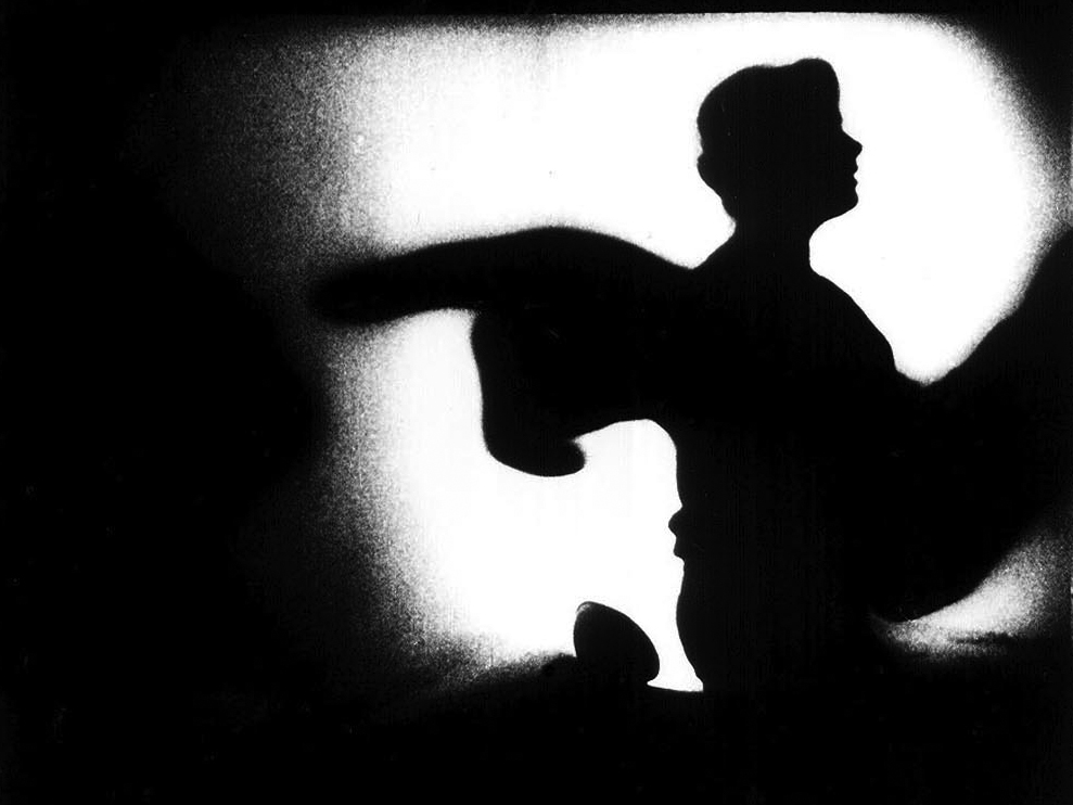 Silhouetted dancers in Peter Kubelka’s Adebar