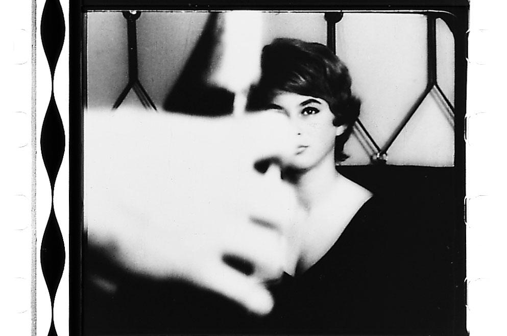 A woman pictured in a film frame from Peter Kubelka’s Schwechater